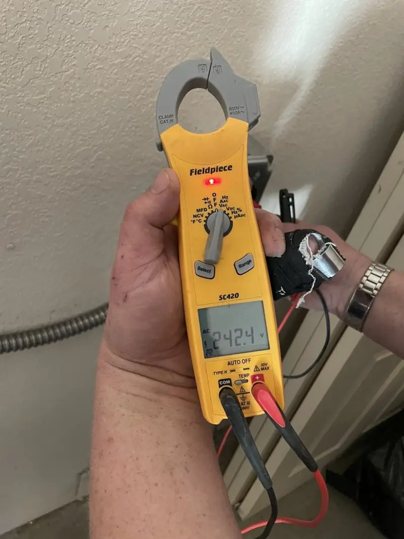 Voltage testing with clamp meter during Generator Installation in West Sacramento